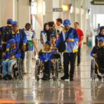 para atlet disabilitas didampingi para pendamping dalam perhelatan NPCI