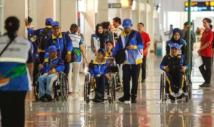 para atlet disabilitas didampingi para pendamping dalam perhelatan NPCI