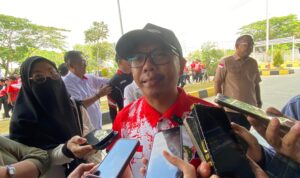 Rasman saat diwawancara awak media