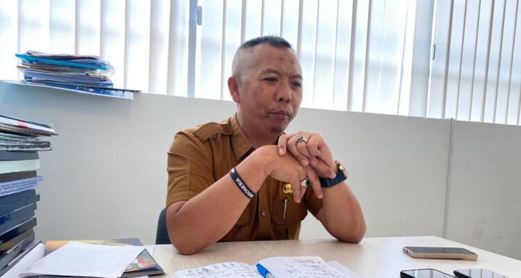 Kabid Peningkatan Prestasi Olahraga Rasman Rading