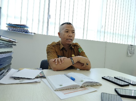Kepala Bidang Peningkatan Prestasi Olahraga Dispora Kaltim, Rasman Rading