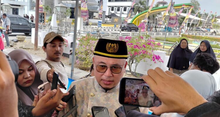 Kepala Disdikbud Kukar, Saat di Wawancarai Awak Media Usai Mengikuti Kegiatan Beseprah, Kamis (24/9/2026).